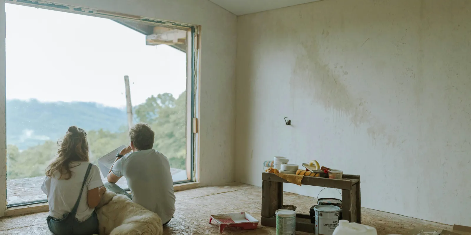 Temporary plastic containment wall inside a home renovation.
